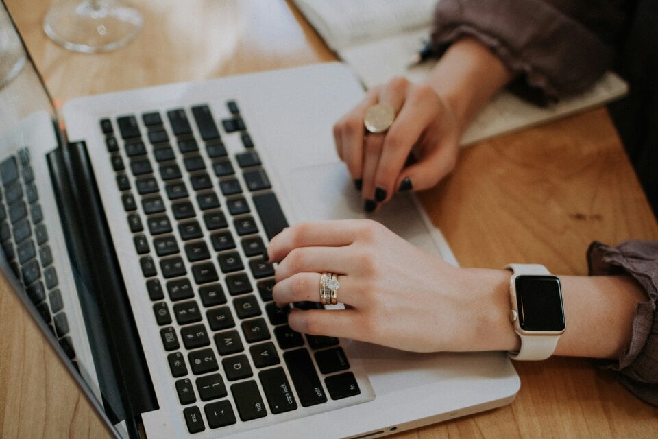 An above image of somebody using a laptop