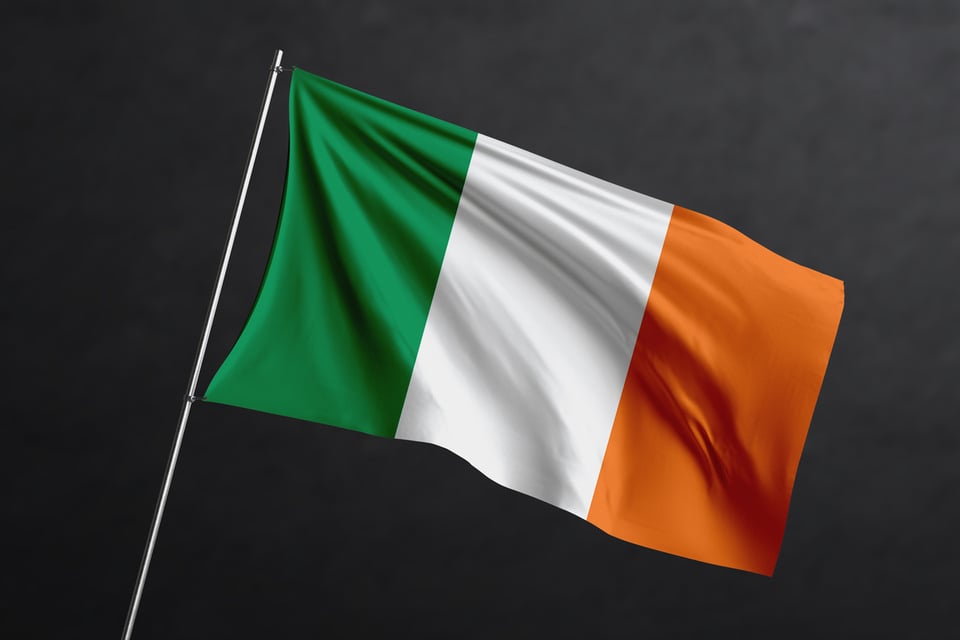 Irish flag against a black background